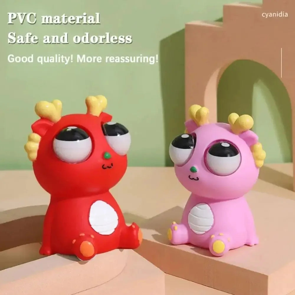 Big Eyed Dragon Squishy Toy | Pop Eyes Fidget Keychain for Stress Relief close-up view