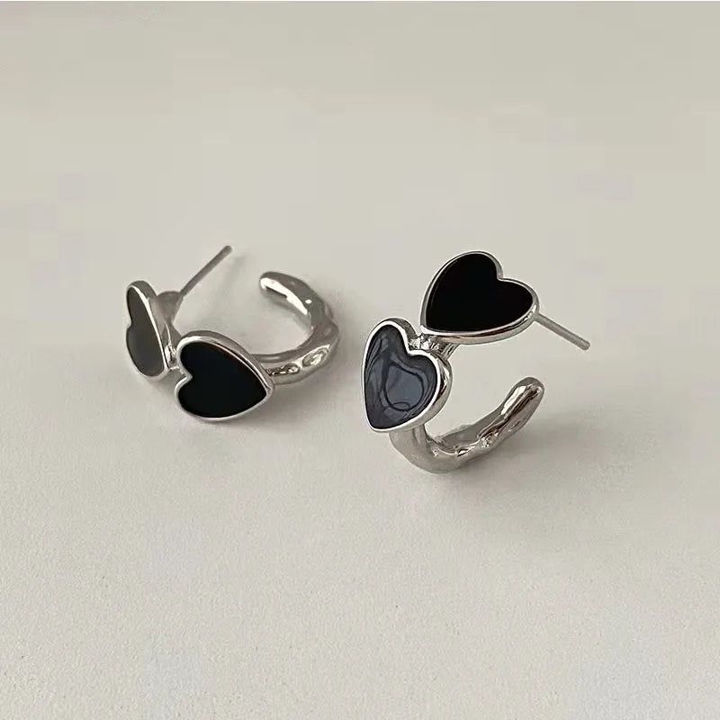 Vintage Goth Black Enamel Heart Stud Earrings for Women Fashion Sweet Hollow Metal C-S close-up view