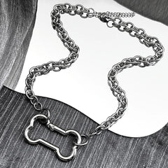 Punk Dog Bone Pendant Necklace | Stainless Steel Silver Goth Choker close-up view