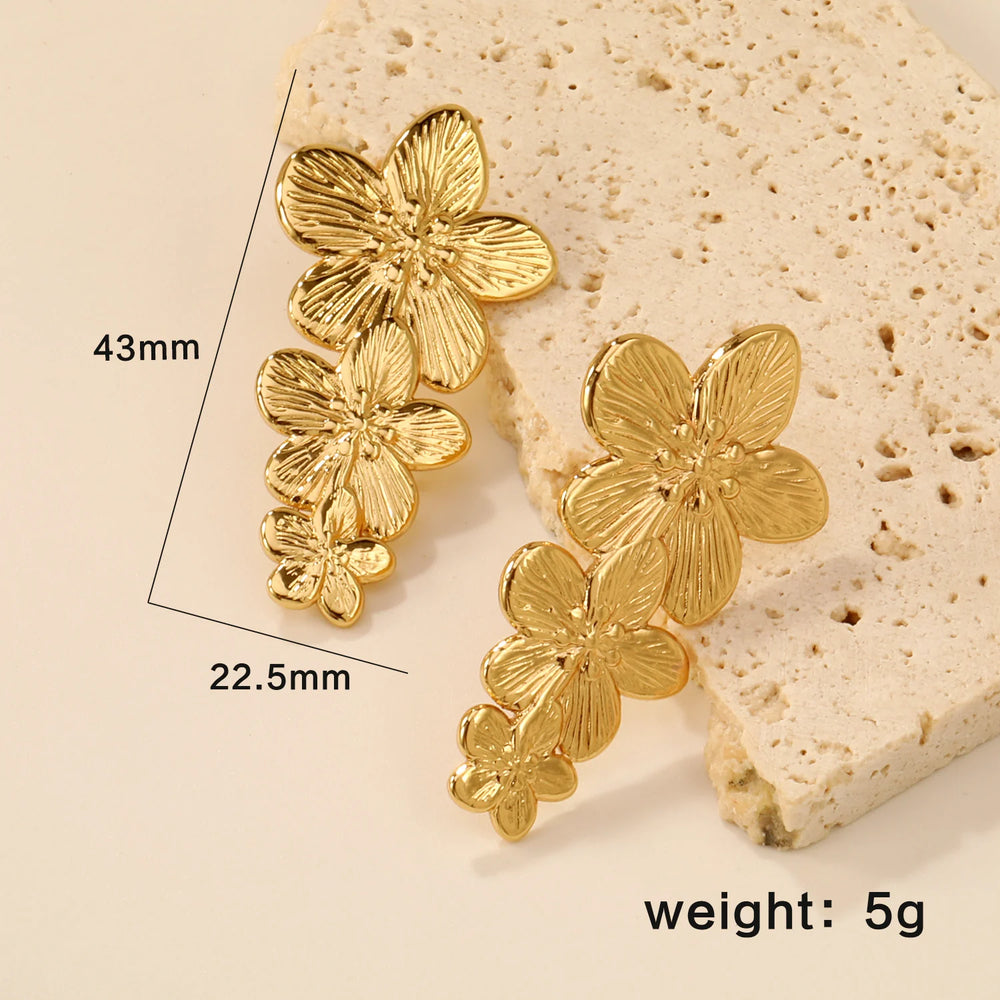LUXUKISSKIDS Fairy Flower Earrings Stud | Gold-Plated Stainless Steel Piercing Jewelry close-up view