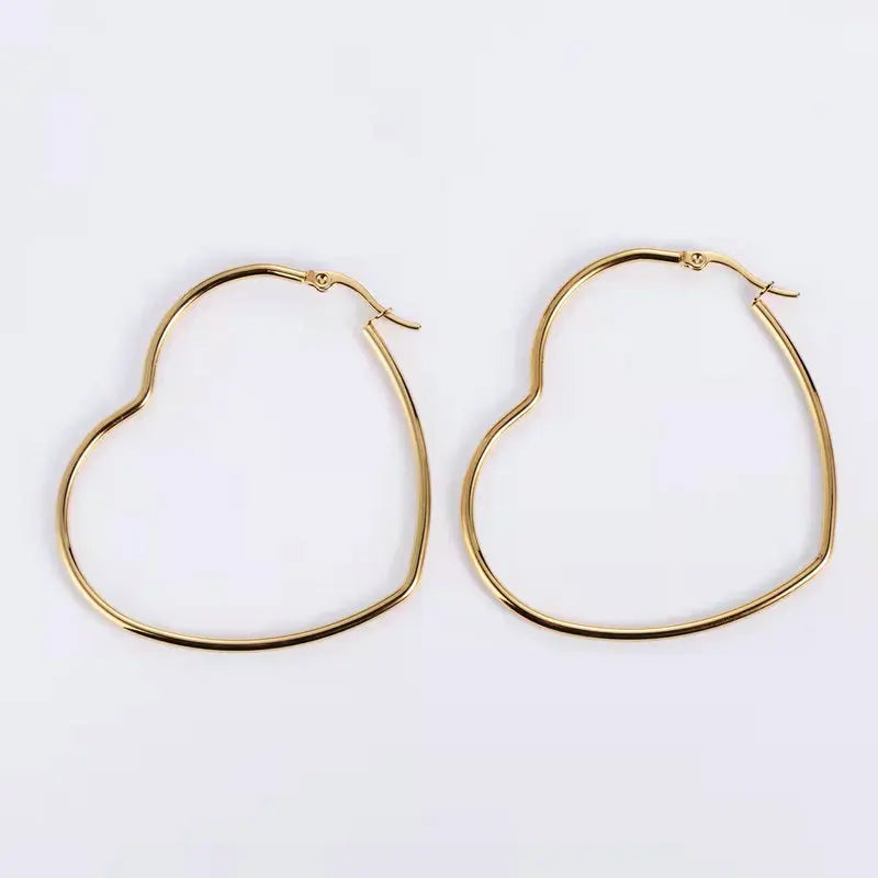 Trendy Hollow Heart Earring Cuff | Fashion Hoop Earrings for Women close-up view