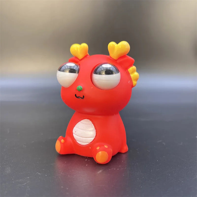 Creative Pop Up Sensory Toy Explosive Eye Dragon Dinosaur Decompression Toy Squeezing close-up view