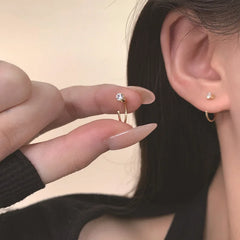 Elegent Minimalist Zircon Stud Earrings for Teens Ear Piercing Earrings Women Men Wedd close-up view
