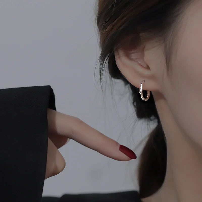 Silver Hoop Earrings | Trendy Distorted Round Earrings for Women detail view