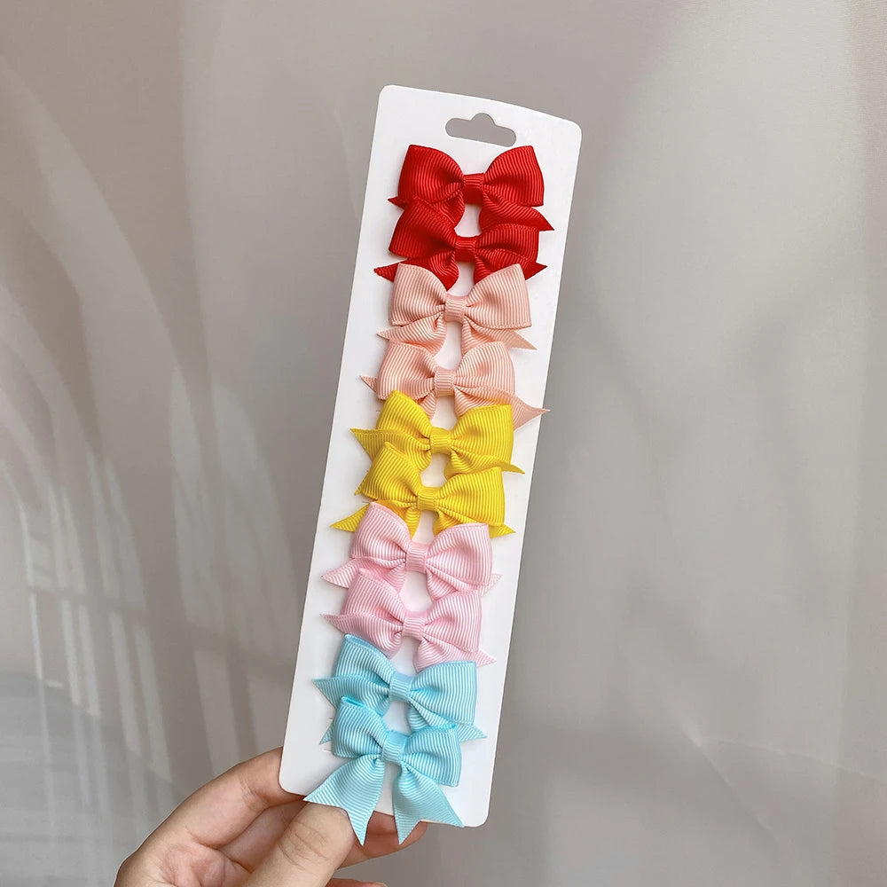10Pcs/Set Solid Color Kids Bows Hair Clips for Baby Girls Handmade Ribbon Bowknot Hair close-up view