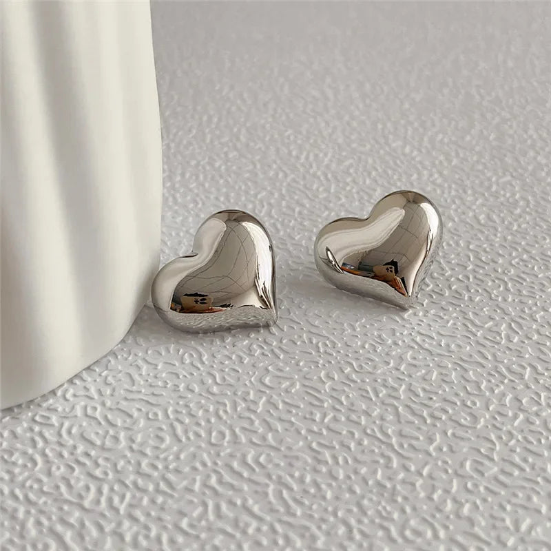 Gold Color Smooth Surface Love Heart Shaped Stud Earrings Women Minimalist Fashion Gi lifestyle view