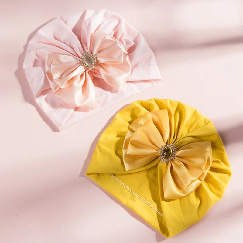 Solid Color Baby Turban Bow Beanie with Rhinestone | Handmade Infant Cap for Girls 0-2 close-up view