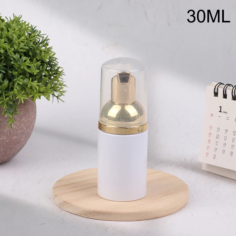 30/50/60ML White Gold Plastic Foamer Pump Bottle Refillable Empty Face Lashes Cleanser close-up view