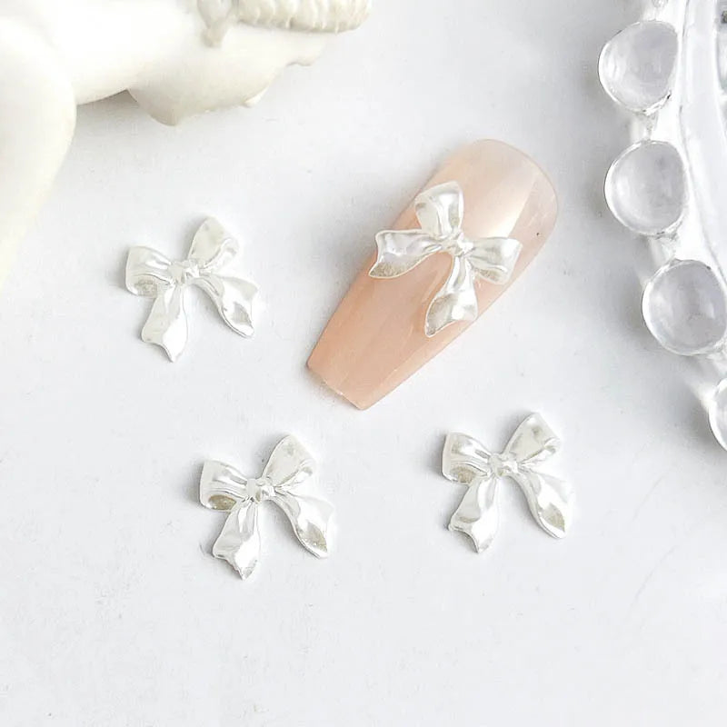 50pcs 3D Sweet Pearly Glossy Ribbon Bow Resin Nail Charms Ballerina Bow Tie Nail Art Dec detail view