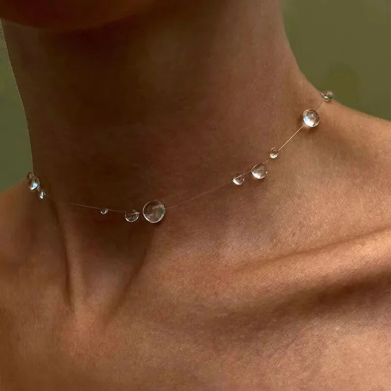 Simple Transparent Water Drop Clavicle Chain Thin Rope Beaded Tassel Earrings Necklace close-up view