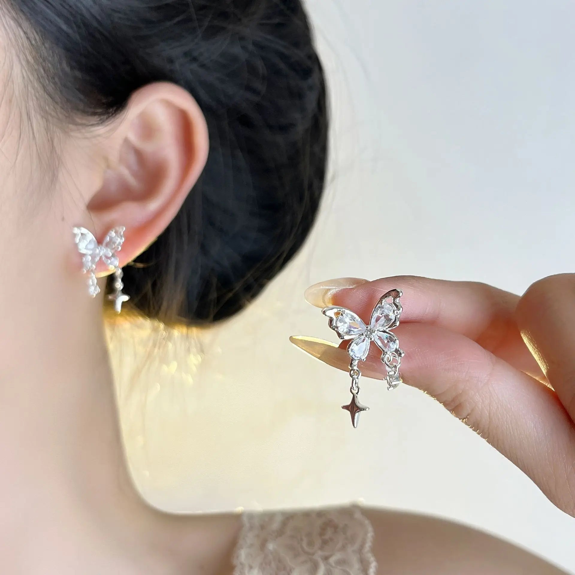 PANJBJ 925 Sterling Silver Bow Knot Earring for Women Texture Tassels Sweet Romantic lifestyle view