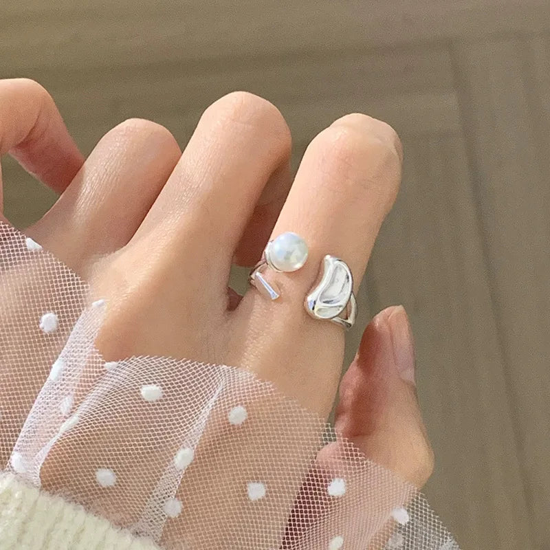PANJBJ 925 Sterling Silver Pearl Irregular Ring for Women Shell Overlapping Hollow Sw lifestyle view