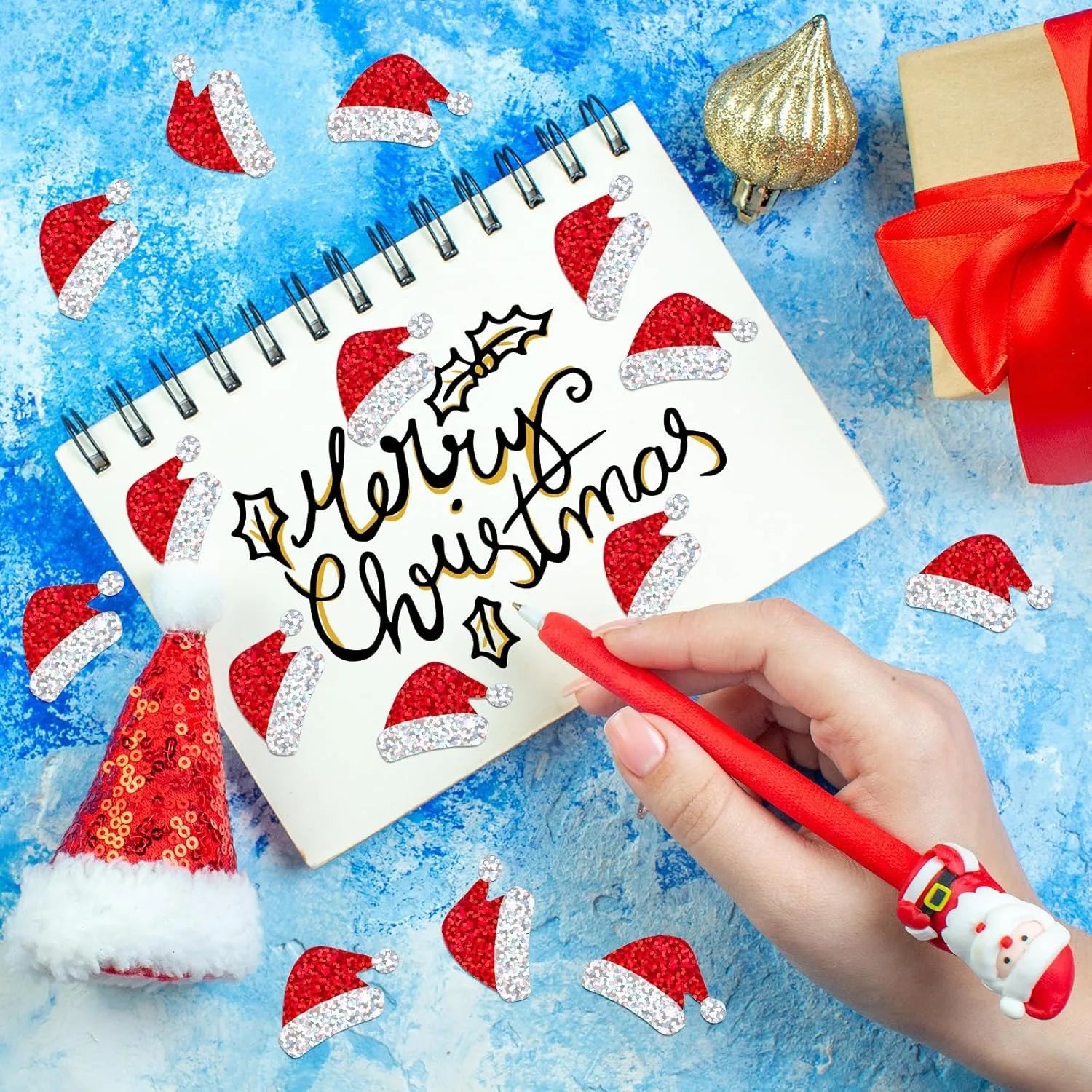 500Pcs Christmas Hat Stickers Roll | Laser Red Santa Hat Seal Stickers for Envelopes lifestyle view
