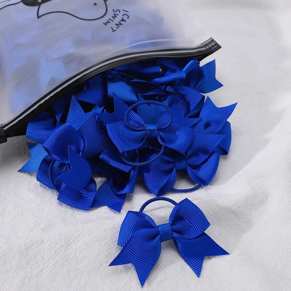 10Pcs/lot Grosgrain Ribbon Pigtail Hair Bows Elastic Hair Ties Hair Bands Holders Girl close-up view