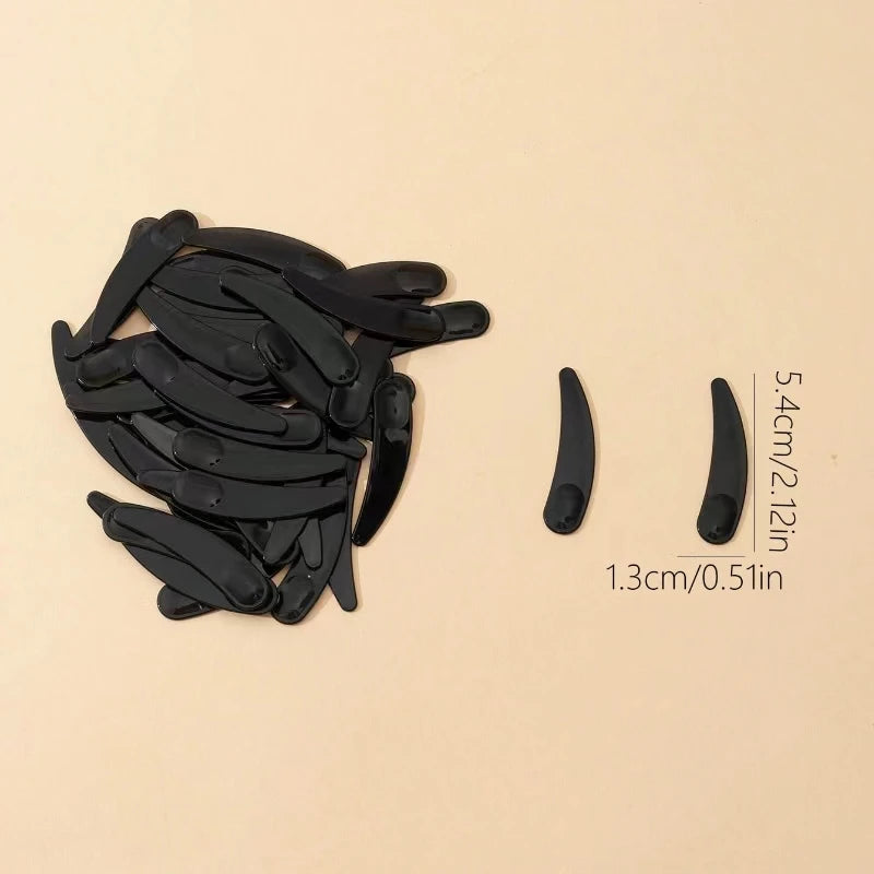 Plastic Face Cream Spoon Set | 50-Pack Crescent Spoons for Skincare close-up view