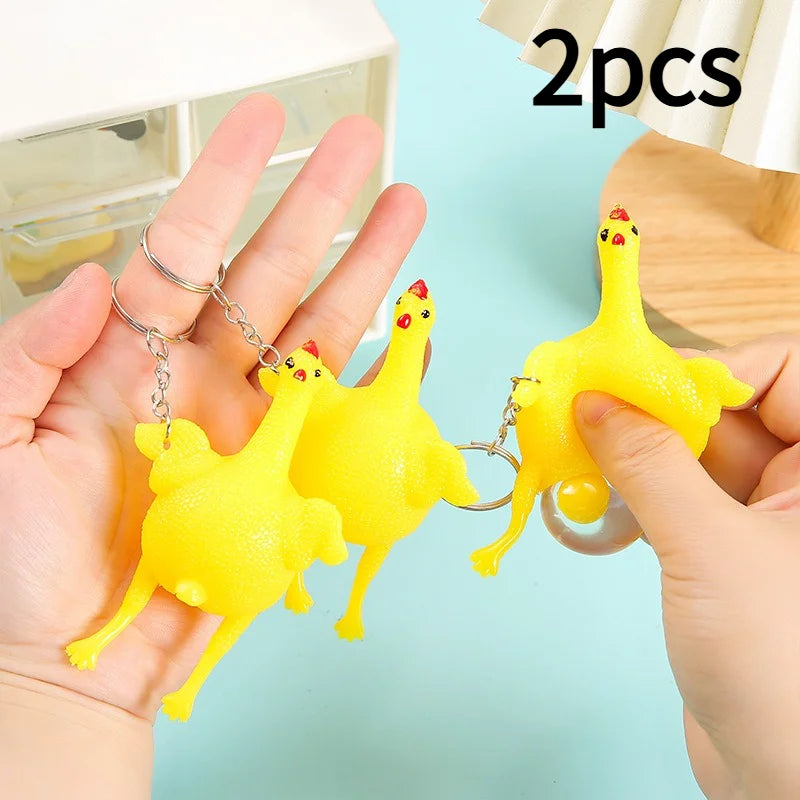 1/2pcs Funny Mini Chicken Keychain, Squeezable TPU Egg-Laying Duck Toy, Creative Nove alternate view