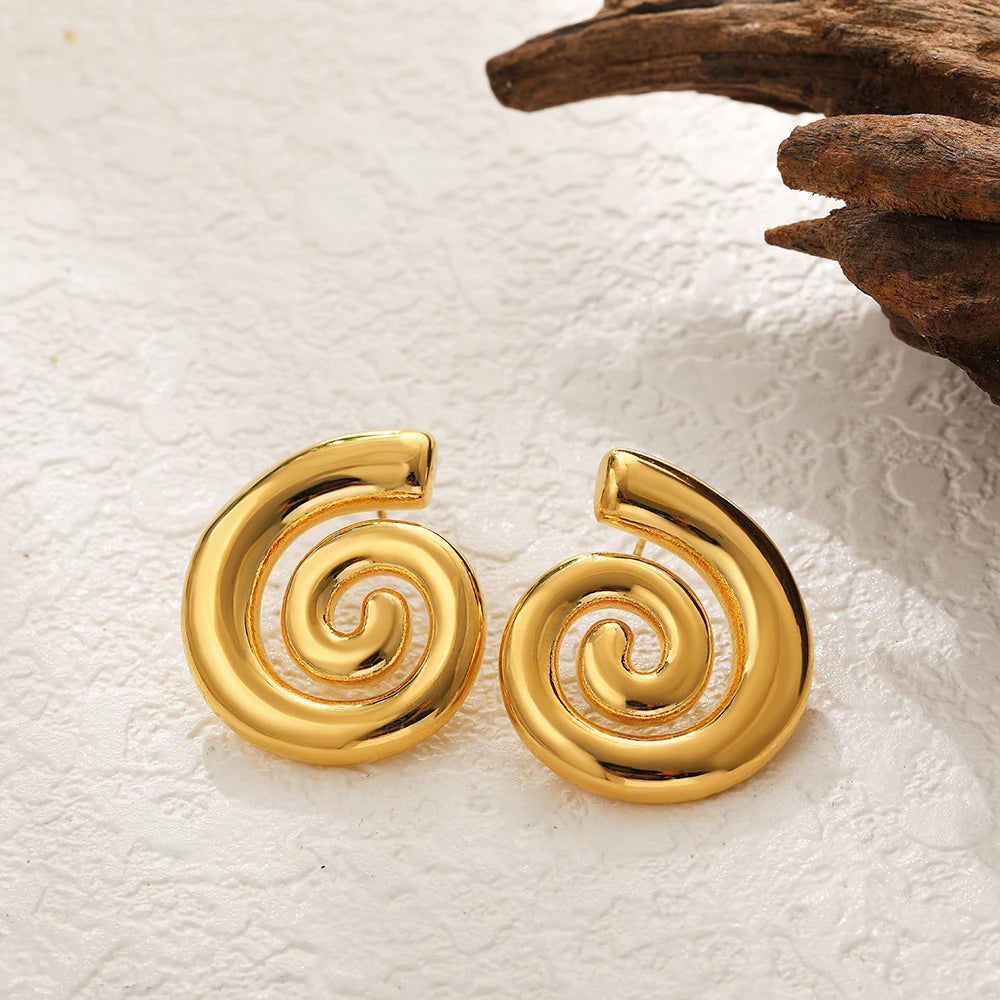 Vintage Gold Snail Shell Drop Earrings | CZ Zircon Beach Jewelry for Women close-up view