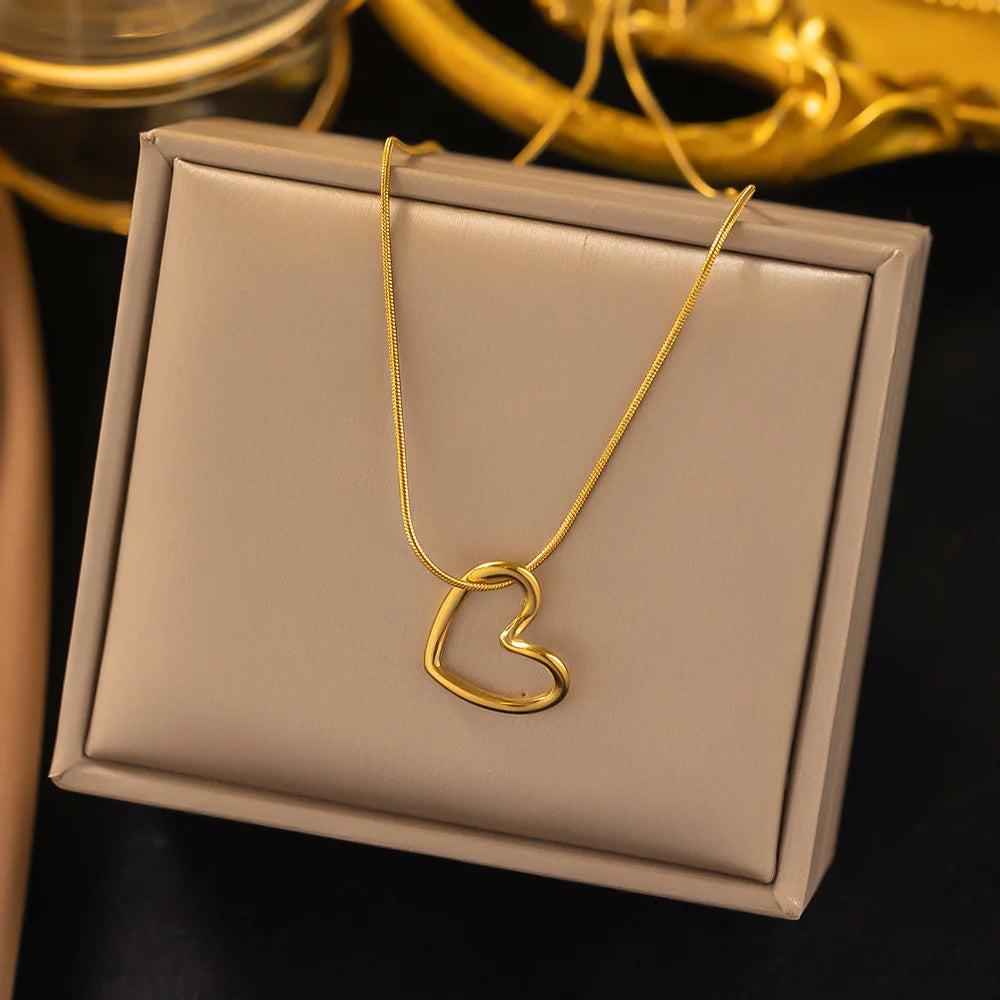 ANENJERY Stainless Steel Twist Hollow Heart Pendant Necklace | Trendy Clavicle Chain for detail view