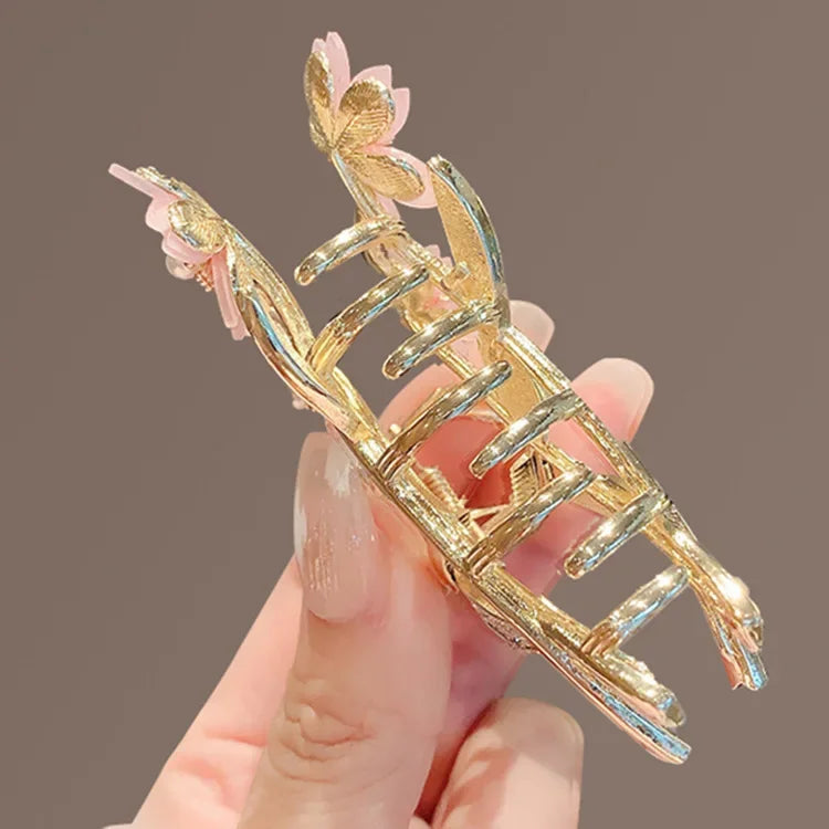 Shiny Rhinestone Pearl Sakura Hair Clip Women's Back of Head Flower Hair Claw Elegant close-up view