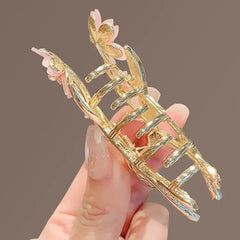 Shiny Rhinestone Pearl Sakura Hair Clip Women's Back of Head Flower Hair Claw Elegant close-up view