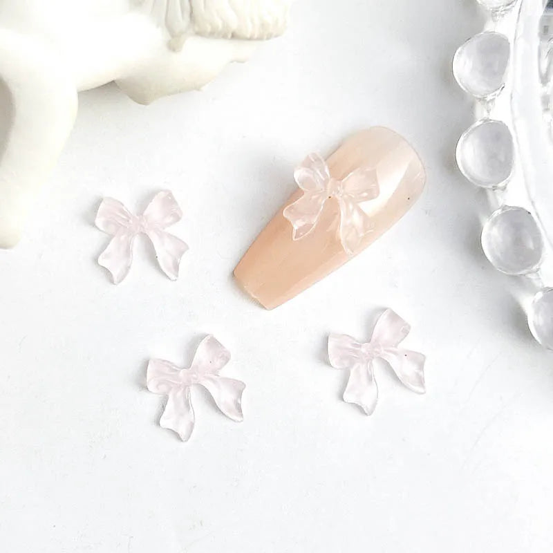 50pcs 3D Sweet Pearly Glossy Ribbon Bow Resin Nail Charms Ballerina Bow Tie Nail Art Dec detail view