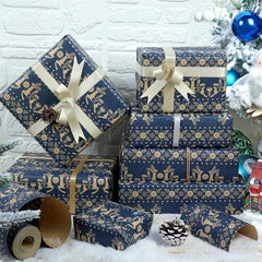 Navy Blue Kraft Christmas Wrapping Paper Roll | Snowflake, Floral and Reindeer Design close-up view