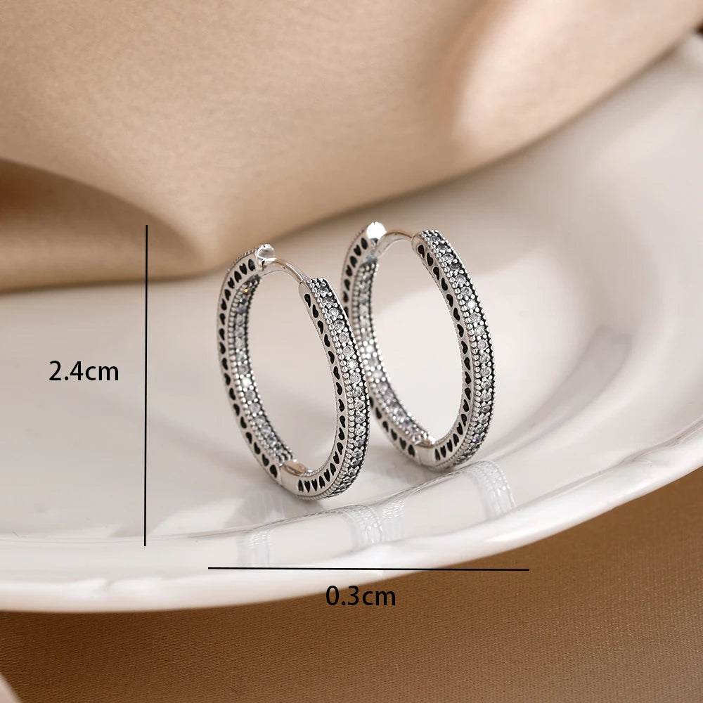 2026 New 925 Silver Butterfly Shining Zircon Heart shaped Earrings Suitable for Europe close-up view