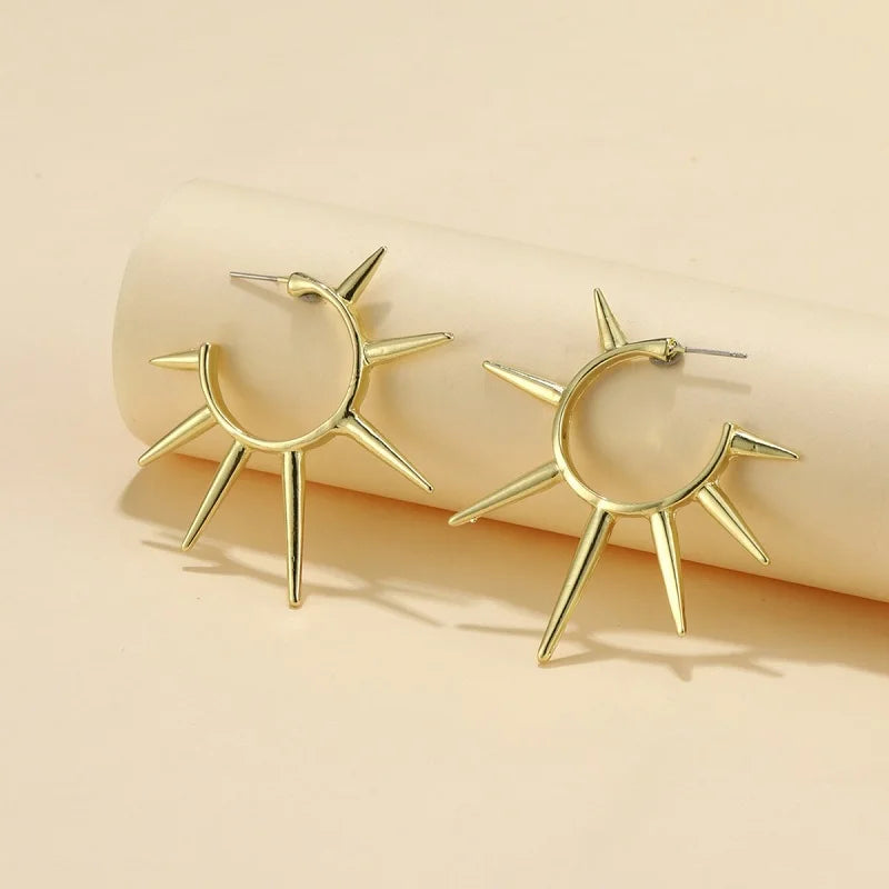 Punk Exaggerated Gold Colour Sun Shape Stud Earrings for Women Hip Hop Rock Metal Irre close-up view