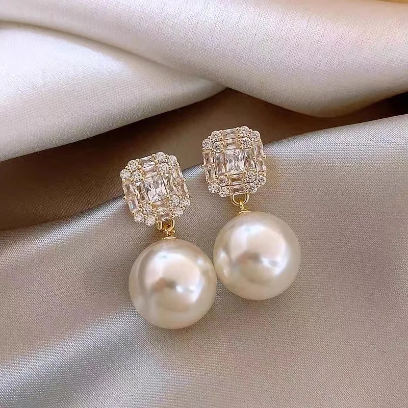 Gold Tone Pearl Drop Earrings | Shiny Crystal Pendant Jewelry alternate view