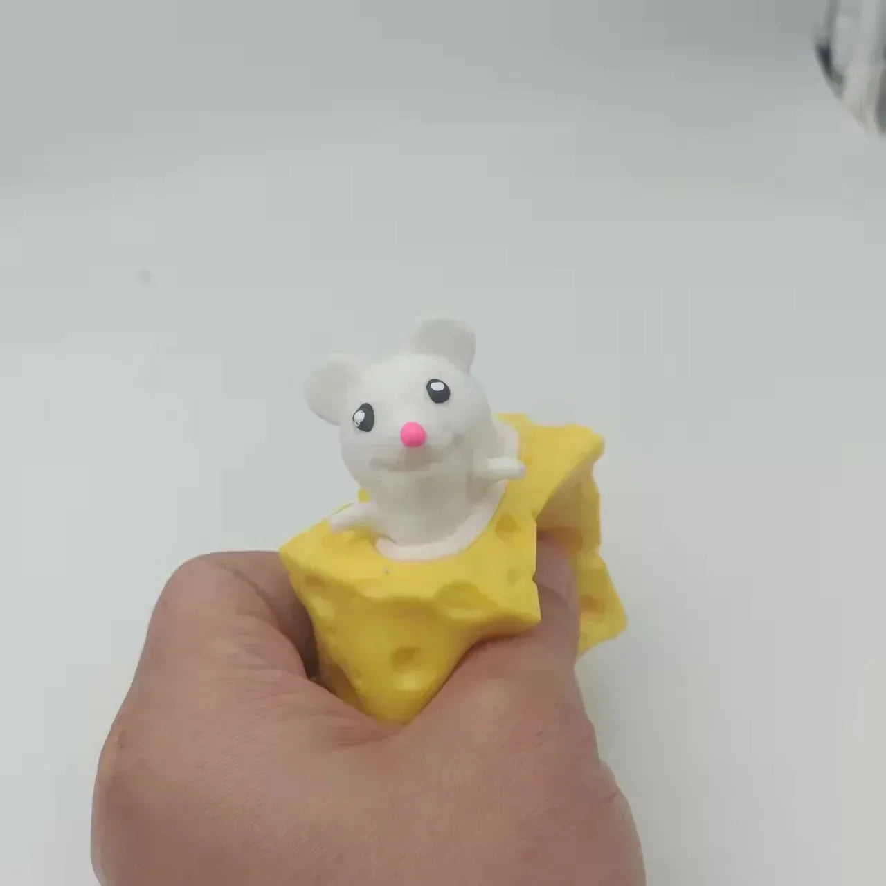 Stress-relieving Pet Cheese Mouse Cheese Pinch Fun Stress Ball Vent Squirrel Cup Prank close-up view