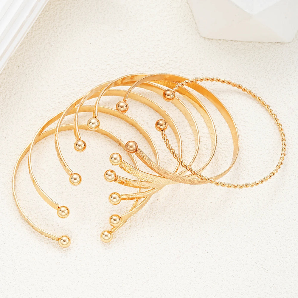 7 Pcs/Set Punk Gold Color Bracelets for Women Streetwear Goth Heart Prints Metal Desig close-up view