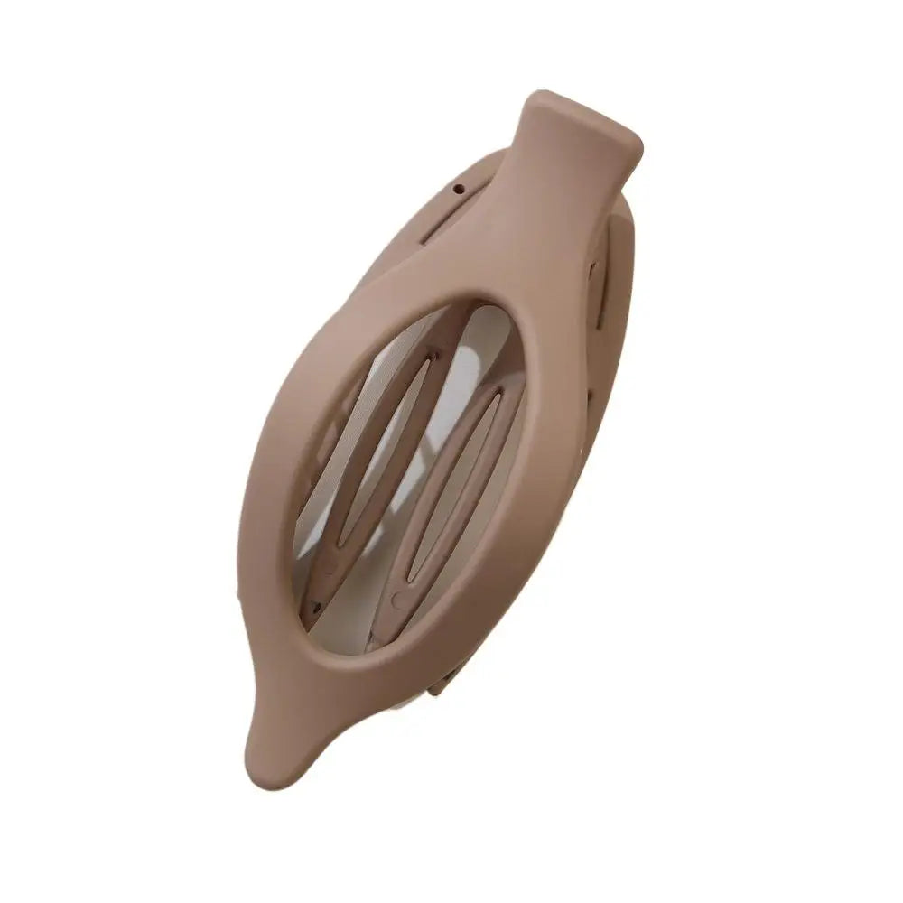 Grote Plastic Haarklauw Clip Matte Kleur Haarklemmen Grip Holte Ovale Geometrische Bar close-up view