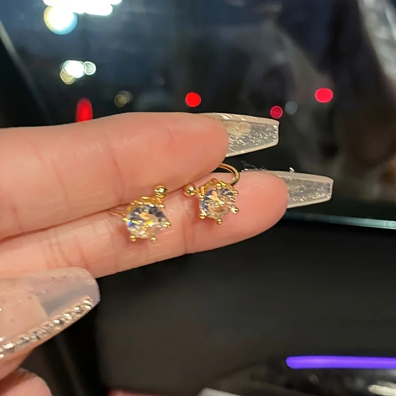 EVISPOL 2Pcs Fashion Gold Plated Claw Cubic Zirconia Clip Earrings For Women Fake Pie lifestyle view