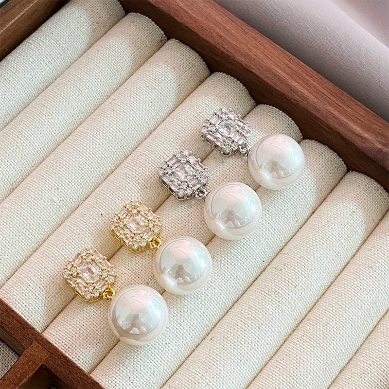 Gold Tone Pearl Drop Earrings | Shiny Crystal Pendant Jewelry additional angle