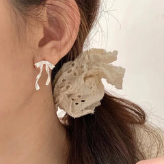 PANJBJ 925 Sterling Silver Bow Knot Earring for Women Texture Tassels Sweet Romantic Kor detail view