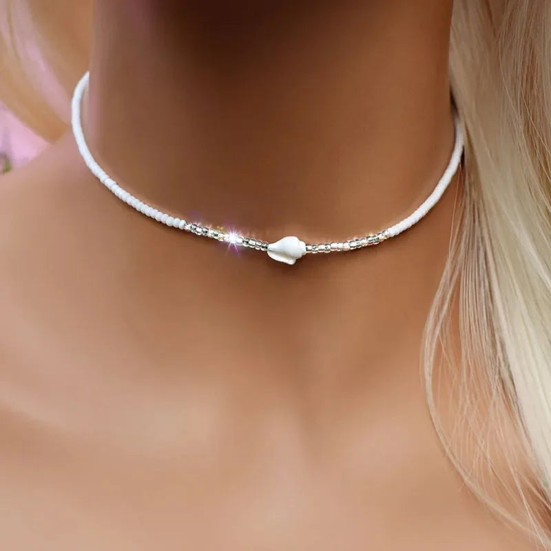 White Glass Seed Bead with Beaded Conch Shells Necklace lifestyle view