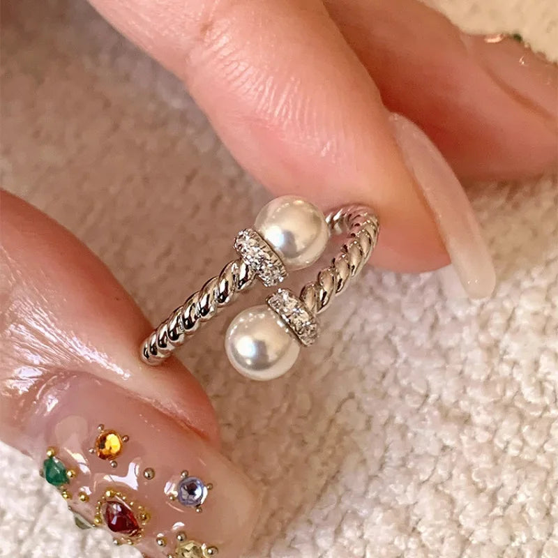 PANJBJ 925 Sterling Silver Pearl Irregular Ring for Women Shell Overlapping Hollow Swe close-up view