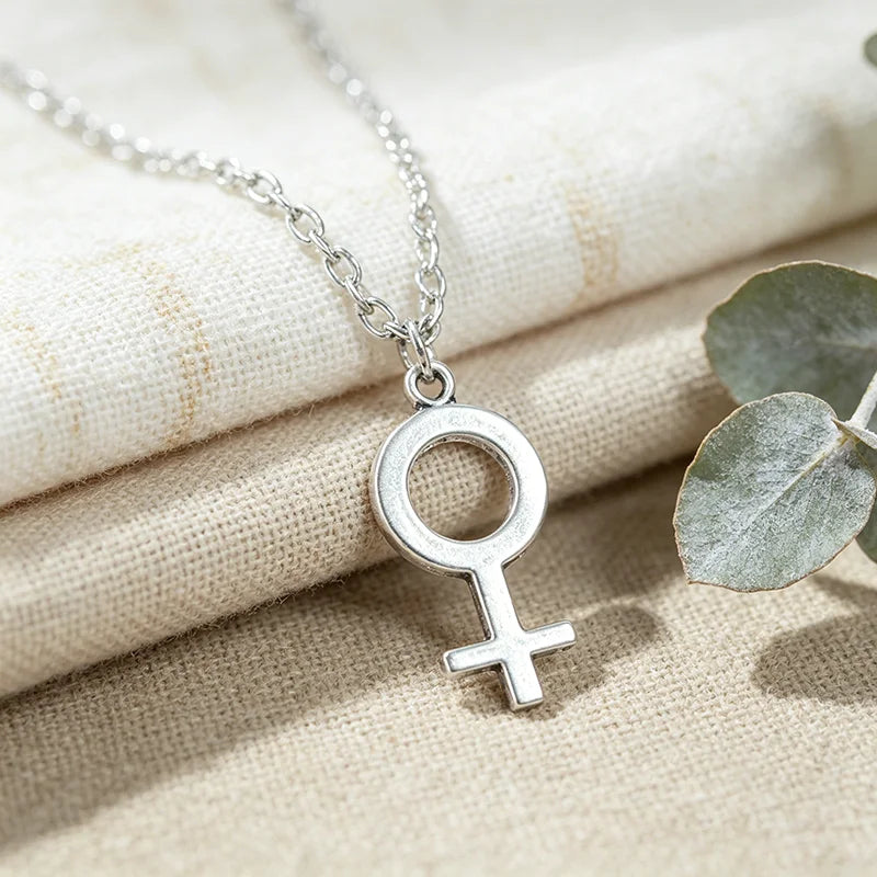 Female Symbol Pendant Necklace - Minimalist Metal Jewelry for Women and Girls close-up view