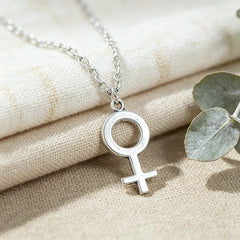 Female Symbol Pendant Necklace - Minimalist Metal Jewelry for Women and Girls close-up view