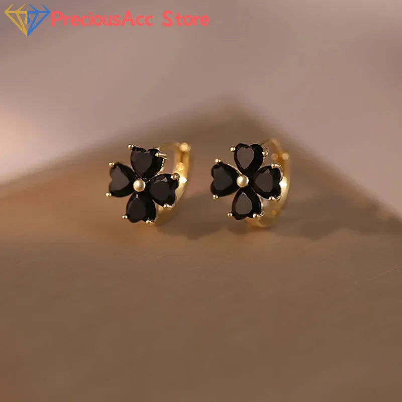 Fashion Black Mini Four-Leaf Flower Stud Earrings Women Jewelry Party Accessories Gift close-up view
