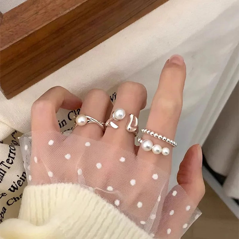 PANJBJ 925 Sterling Silver Pearl Irregular Ring for Women Shell Overlapping Hollow Swe close-up view