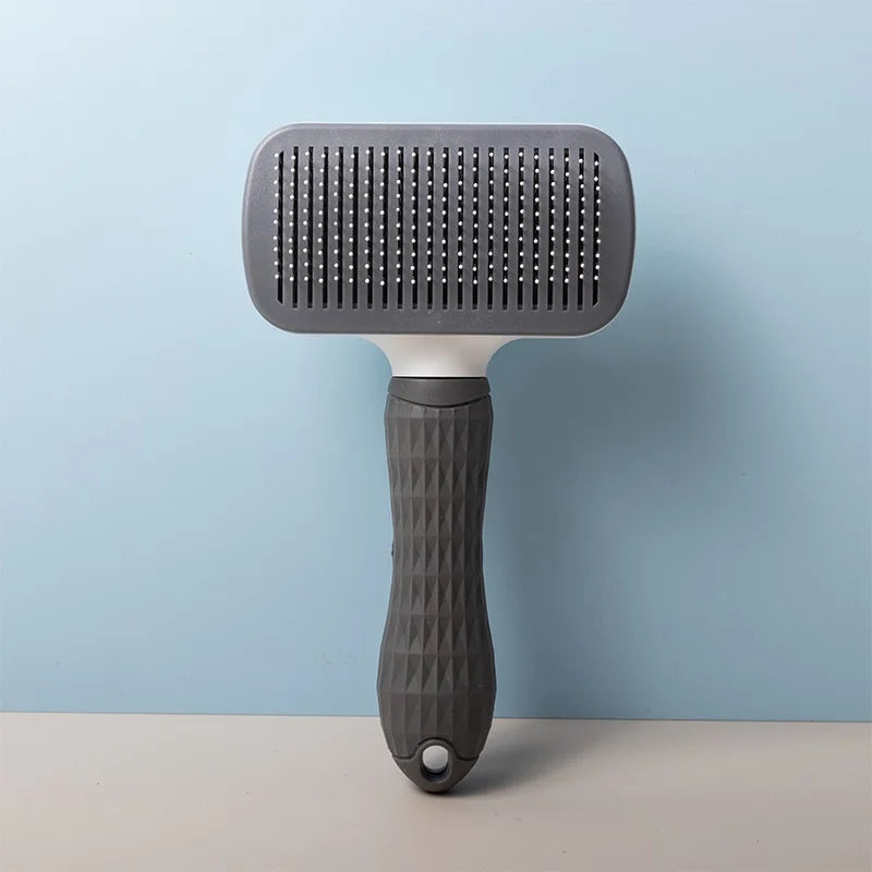 Pet Deshedding Comb | Self Cleaning Needle Brush for Dogs and Cats close-up view