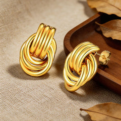 18K Gold Twist Knot Stud Earrings | Geometric Textured Screw-Back Earrings for Women close-up view
