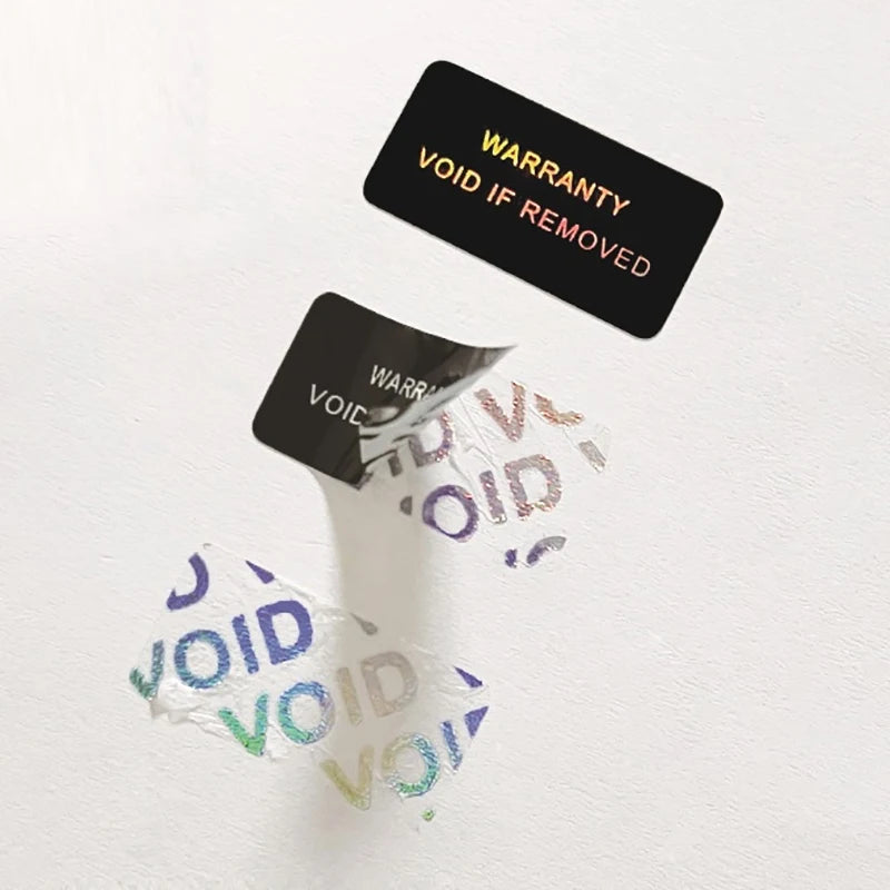 100 Pack Tamper Proof Warranty Stickers | Security Seal Void Labels close-up view