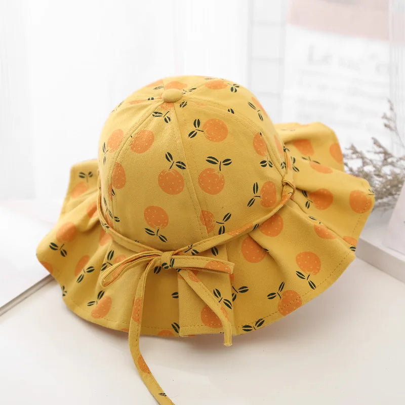 Sweet Baby Summer Hat for Girls | Cotton Fruit Print Kids Bucket Hat with Bowknot close-up view