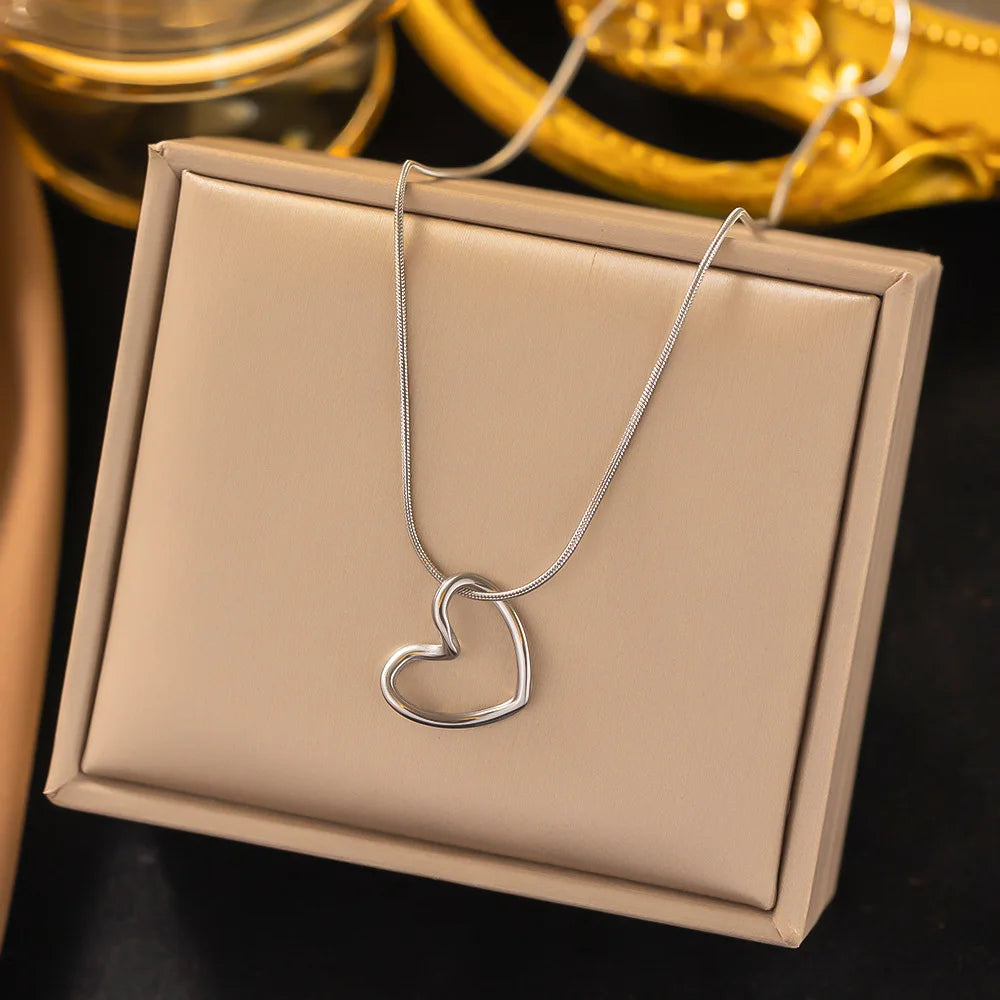 ANENJERY Stainless Steel Twist Hollow Heart Pendant Necklace | Trendy Clavicle Chain alternate view