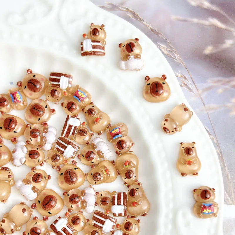 50Pcs Cartoon Cute Resin Capybara Nail Charms Creative Hamster Animal Nail Art Decora lifestyle view