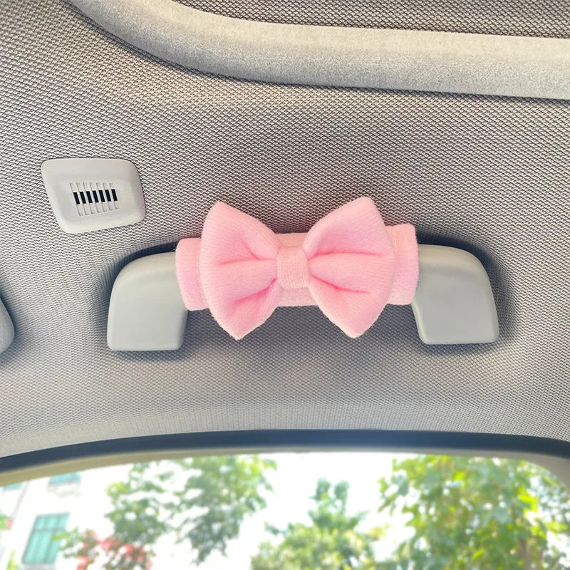 Car Roof Handle Protective Cover Cute Car Decoration Butterfly Bow Roof Armrest Cover close-up view