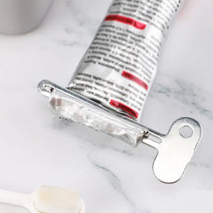 Toothpaste Squeezer Tool Hair Oil Paint Squeezer Rotate Dispenser for Ointments Cosmet close-up view