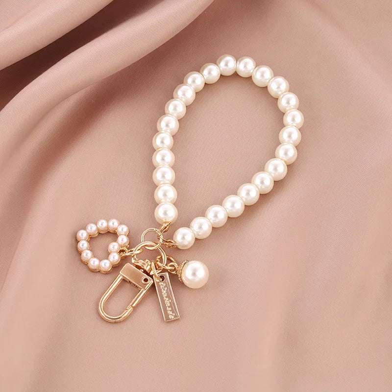 ZAKOL Cute Pearl Keychain for Women Girls Shiny Pearl Bead Shell Phone Bag Backpack additional angle